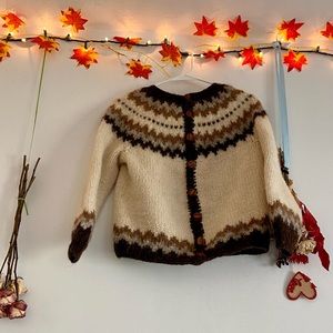 Wool sweaters with wooden buttons